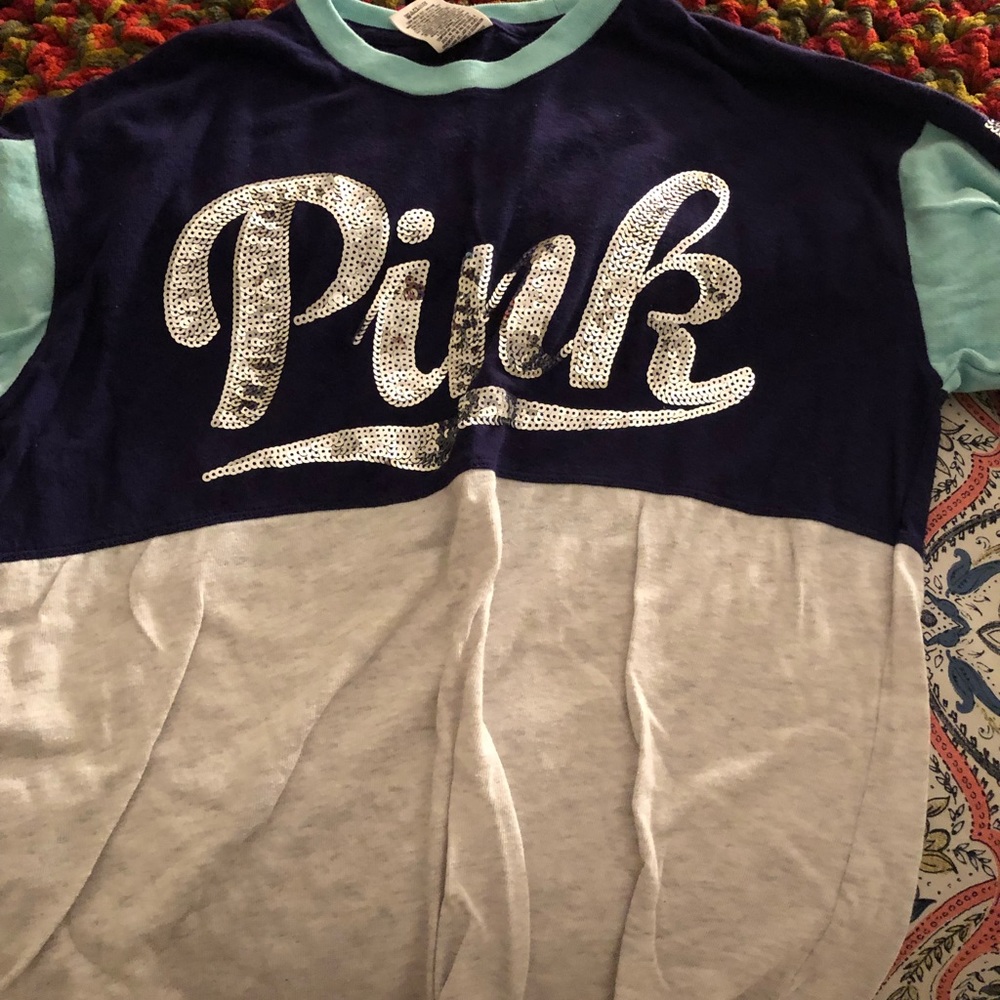 Two Pink Long Sleeve Shirts.
